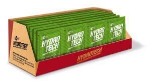 Caja abierta con sobres verdes Hydro Tech bebida hidratante energética en exhibidor rojo y beige